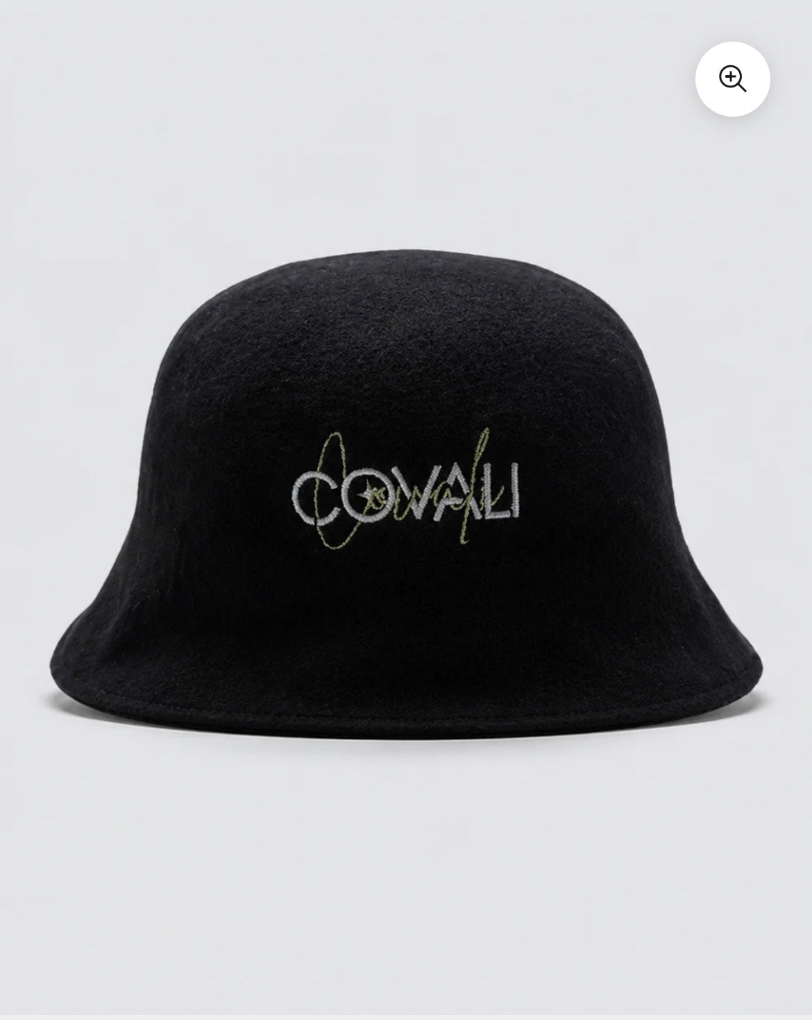 A black felt bucket hat with 'COVALI' embroidered on the front in white and gold, set against a light gray background.